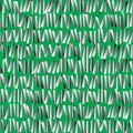 Abstract metal sticks on green surface